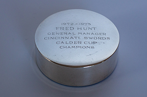 1972-73 Cincinnati Swords Calder Cup Champions replica silver hockey puck.